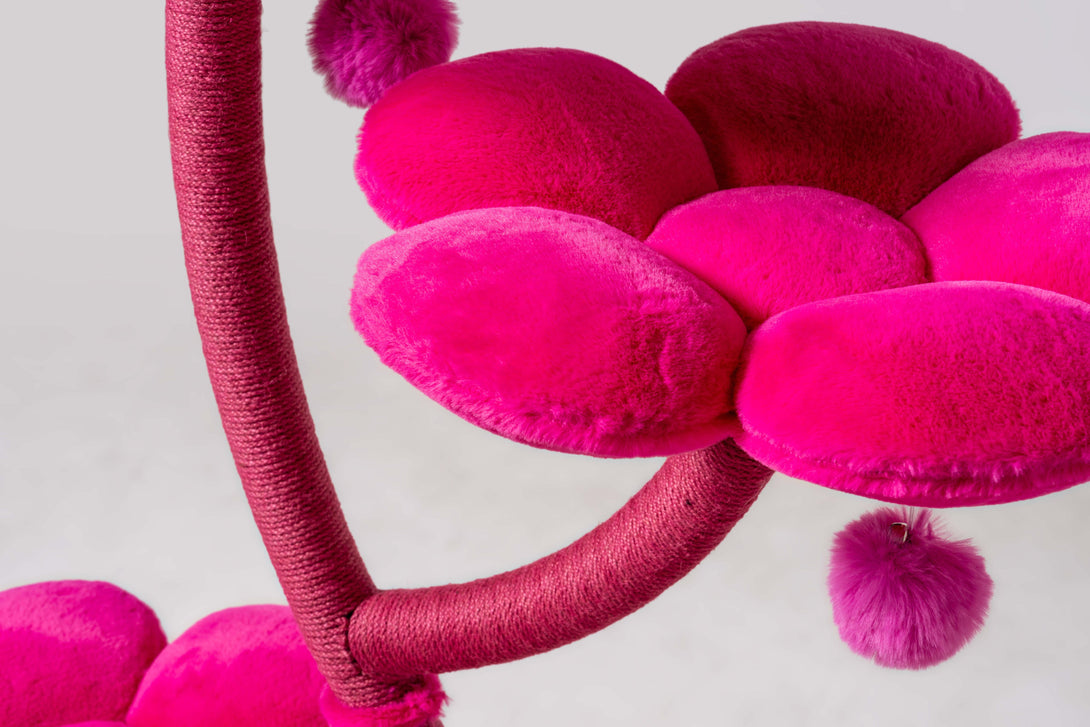 Cats relaxing comfortably on the stylish Fuchsia Blossom Cat Tree
