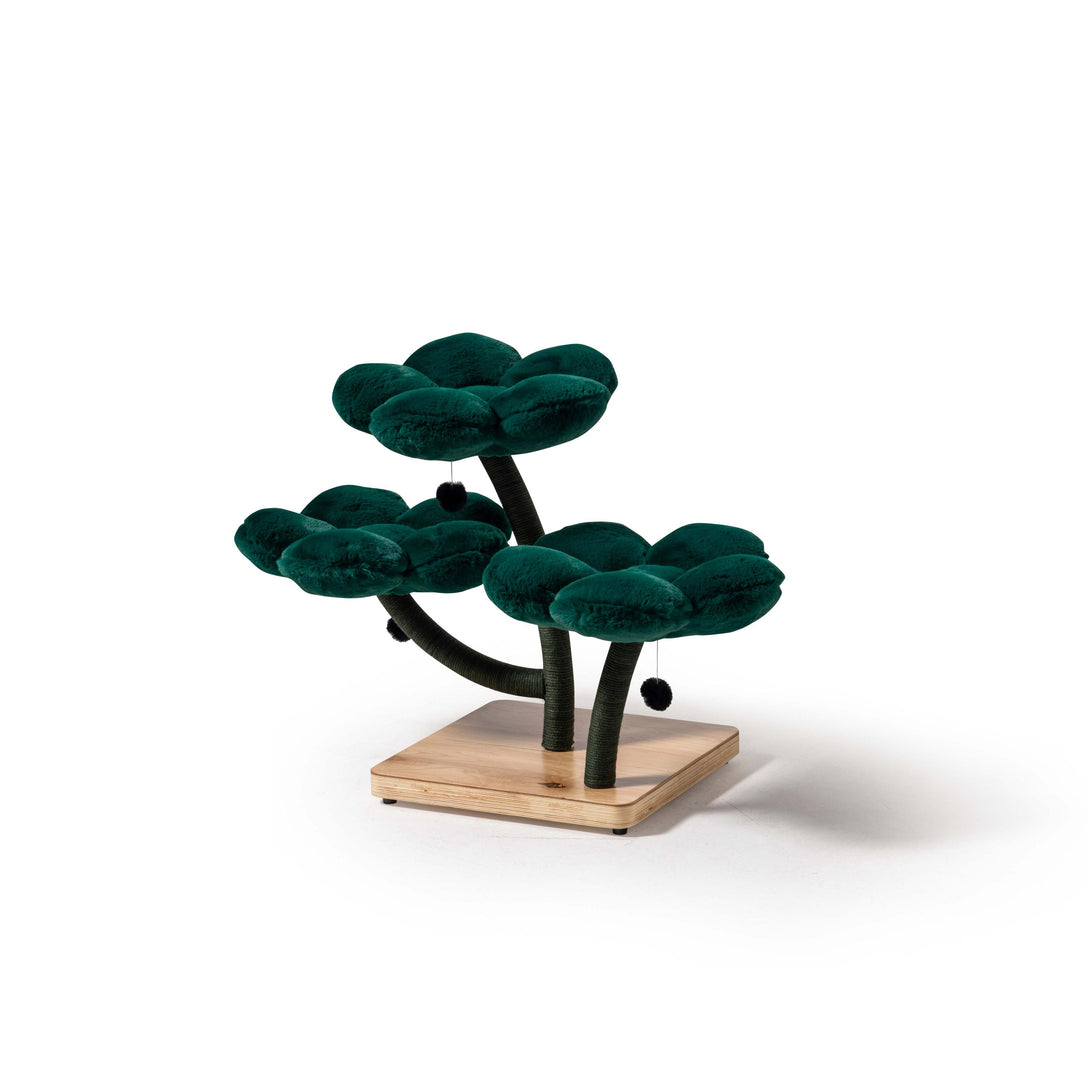 Cozy cat cave nestled in the Emerald Blossom Floral Cat Tree
