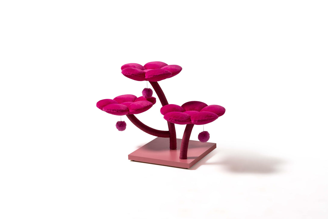 Cozy cat cave within the Fuchsia Floral Cat Tree for relaxation
