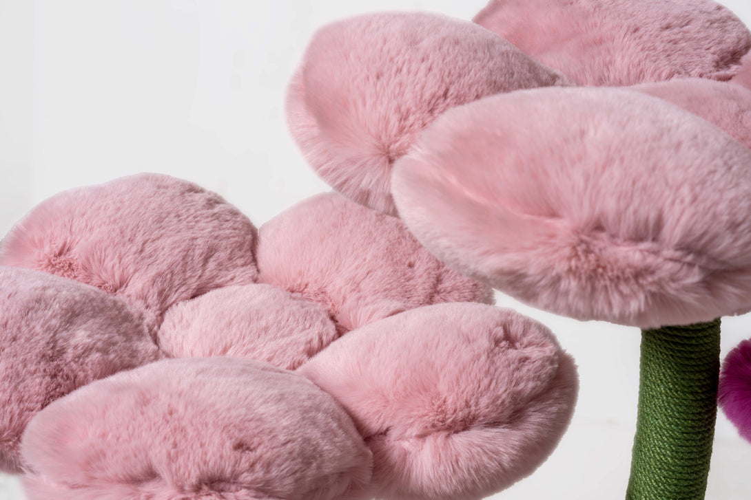 Durable construction of the Powder Pink Blossom Floral Cat Tree for playful activity
