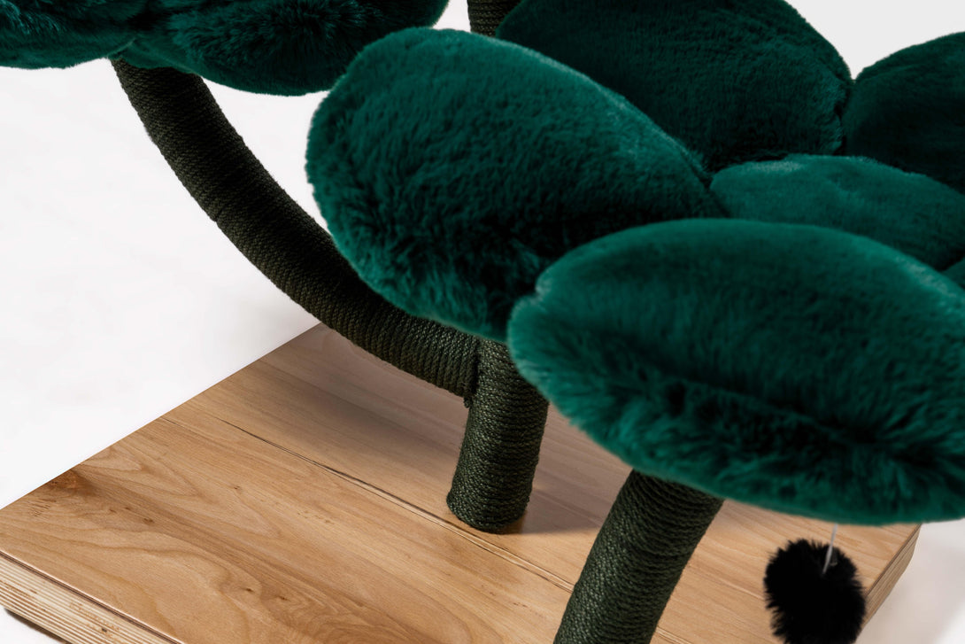 Elegant emerald floral pattern enhancing luxury cat furniture

