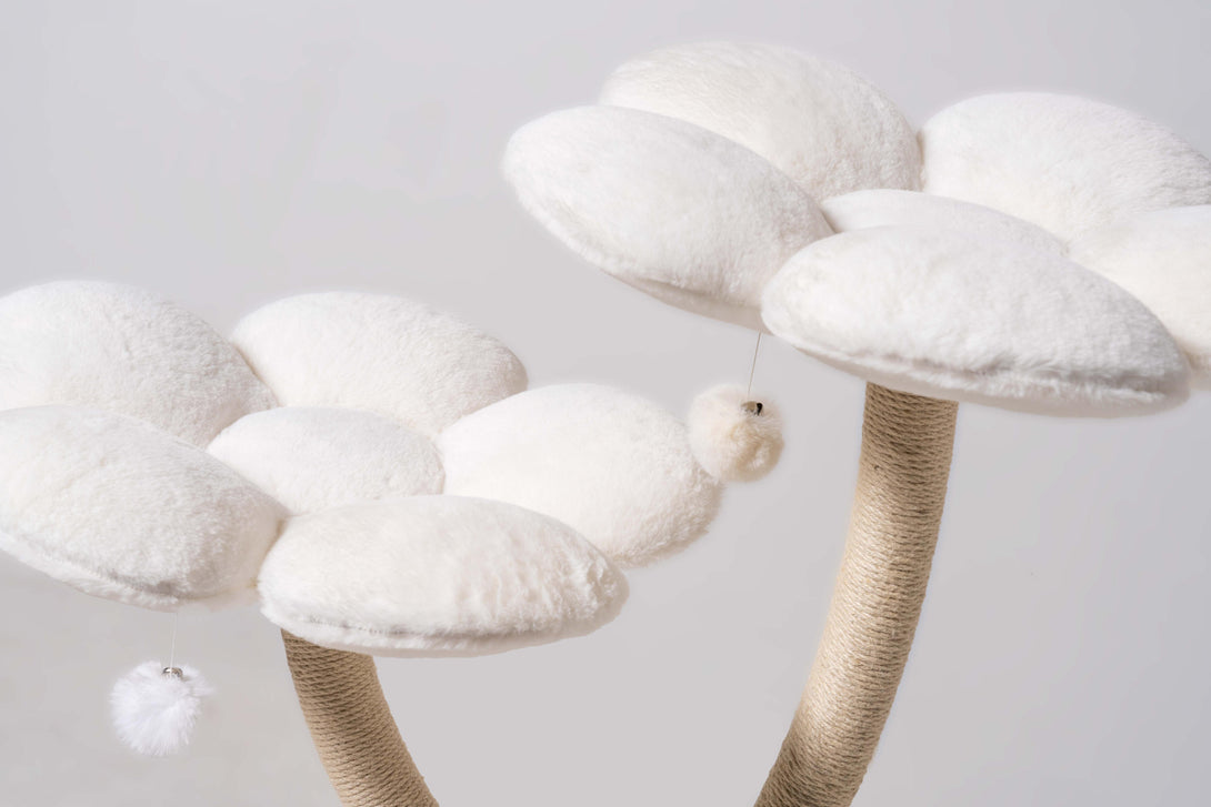 Integrated cat scratching posts on the Elegant White Cat Tower
