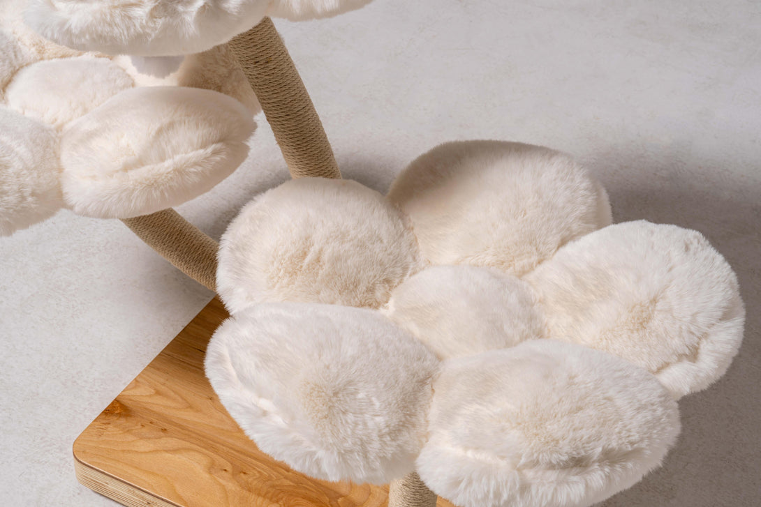 Integrated scratching posts on the Ivory Blossom Cat Tree
