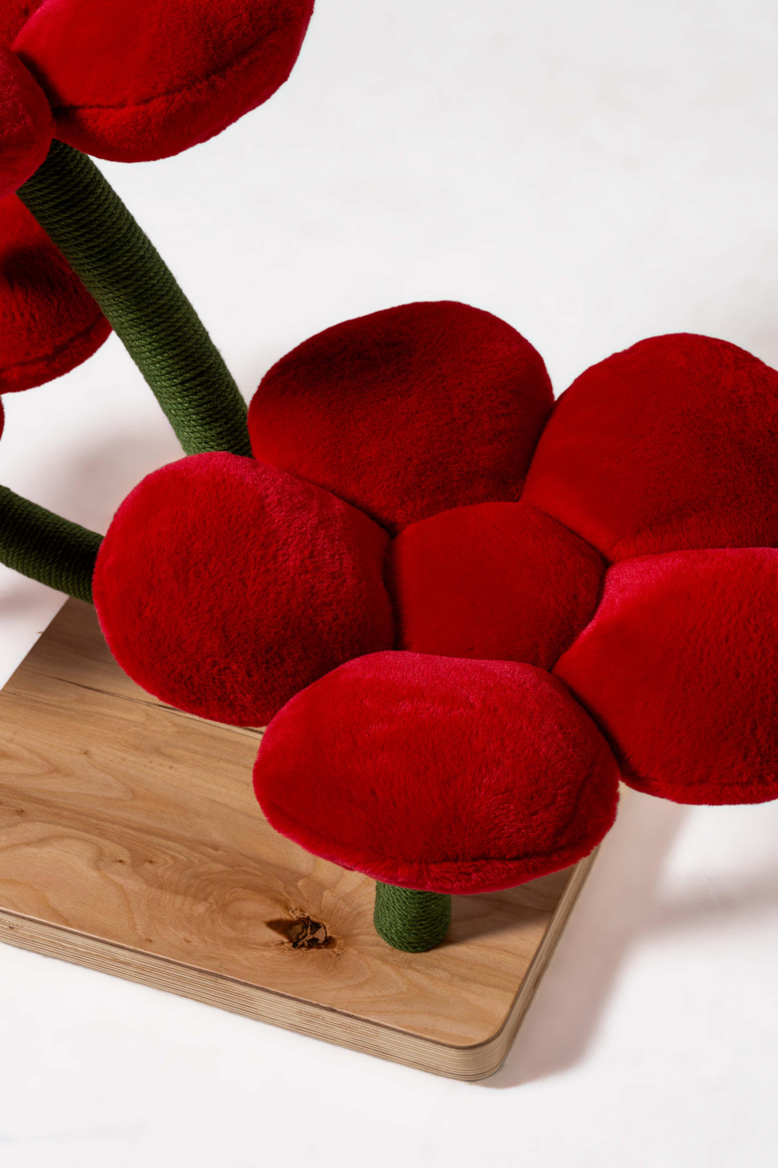 Integrated scratching posts on the Red Blossom Floral Cat Tree
