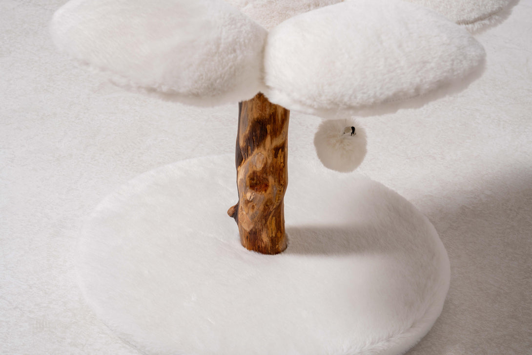 Integrated scratching posts on the White Daisy Cat Perch
