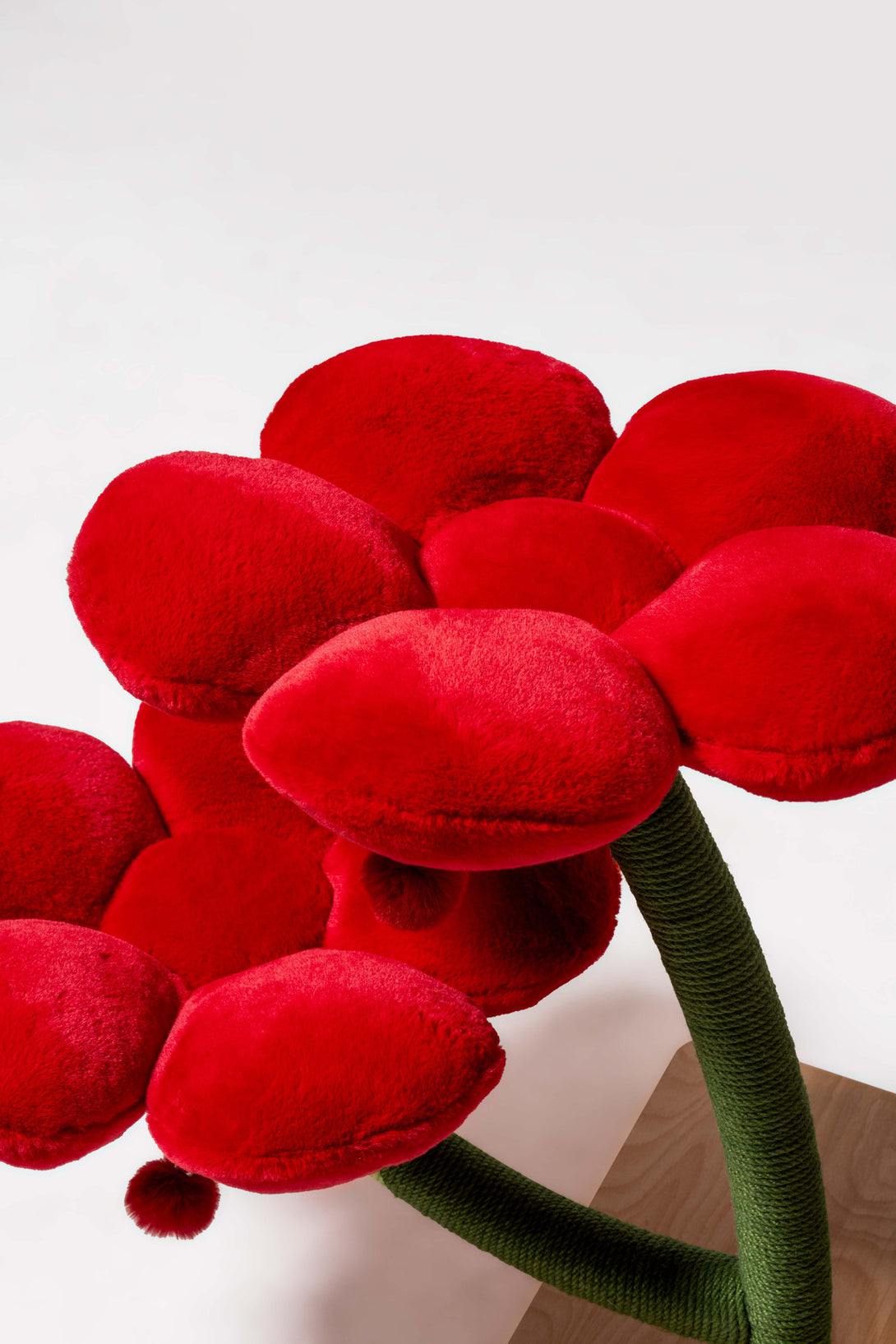 Large cats lounging atop the stylish Red Blossom Cat Tree
