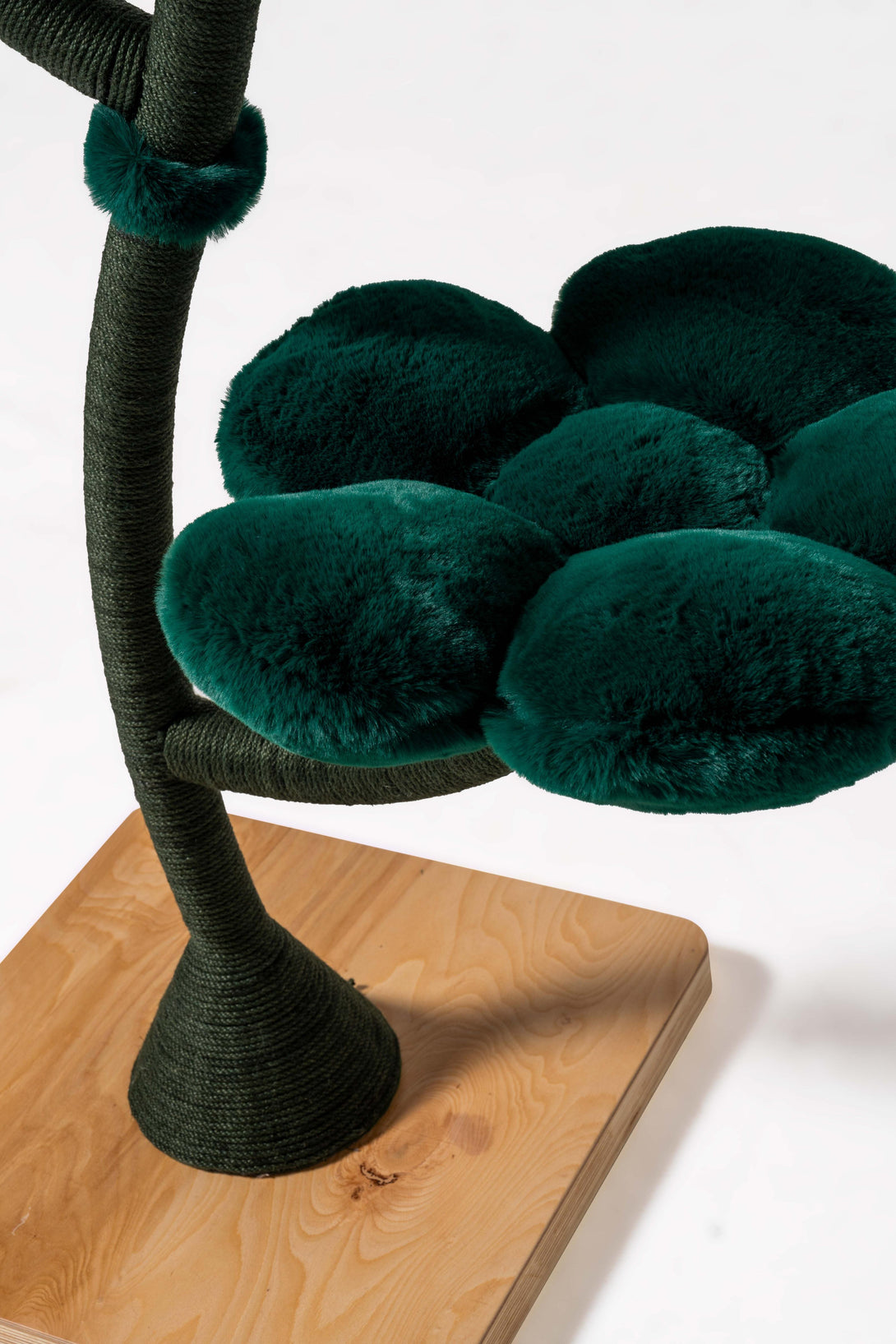 Soft cushions on the Modern Green Cat Tree for optimal comfort
