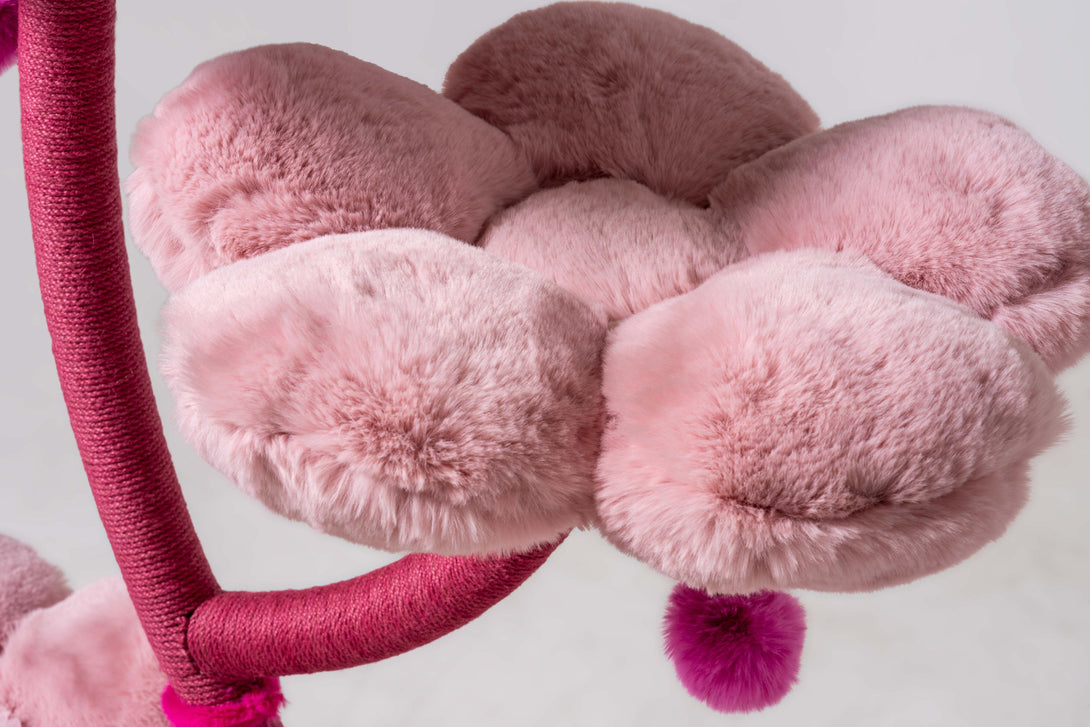 Unique pink floral design enhancing the luxurious cat furniture
