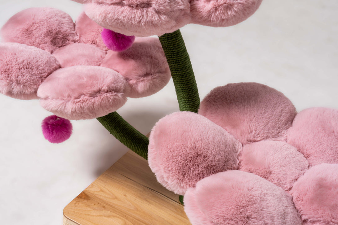Integrated scratching posts on the Powder Pink Blossom Floral Cat Tree
